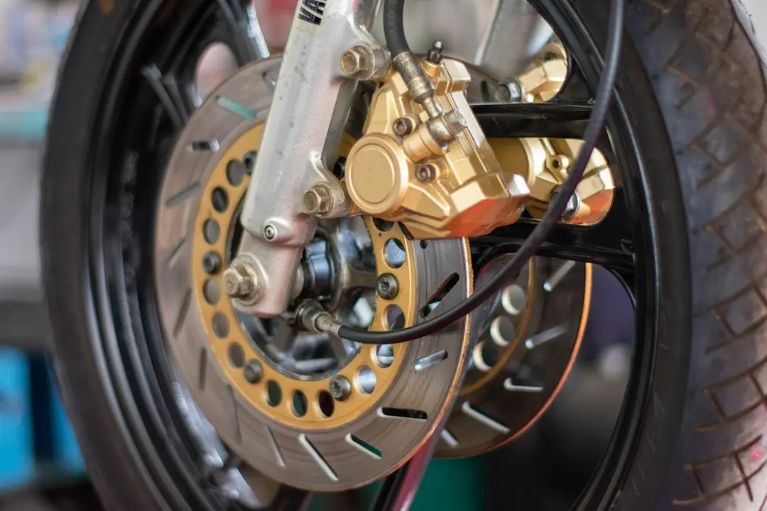 a close up of a motorcycle tire and brake